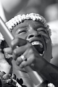 Flag bearer shouting in delight